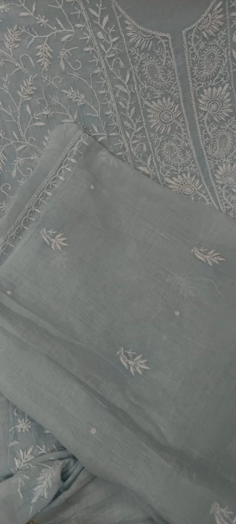 Powder Blue Mulmul Chanderi fine Chikankari Floral Jaal Pattern along with Paisley & Floral Design embellished with Moti & Cut Dana