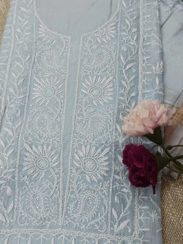 Powder Blue Mulmul Chanderi fine Chikankari Floral Jaal Pattern along with Paisley & Floral Design embellished with Moti & Cut Dana